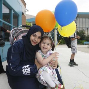 Mom and child at Family Centre Grand Opening